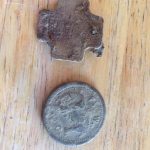 Old dog tag and some kind of token