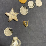 Boucle d'oreille en or trouvée sur la plage - 1